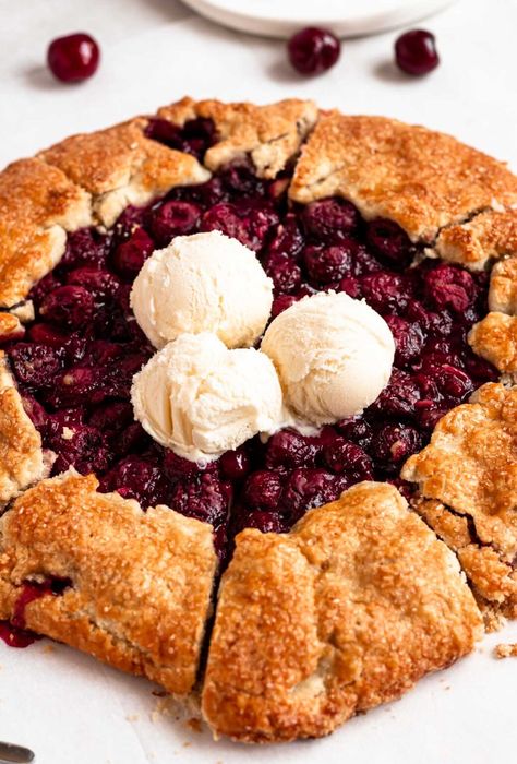 Close up shot of cherry galette with vanilla ice cream on top. Mom Bob, Cherry Galette, Easy Summer Dessert, Apple Crumble Pie, Rustic Dessert, Canning Cherry Pie Filling, Fresh Cherry, Making Whipped Cream, Cherry Filling