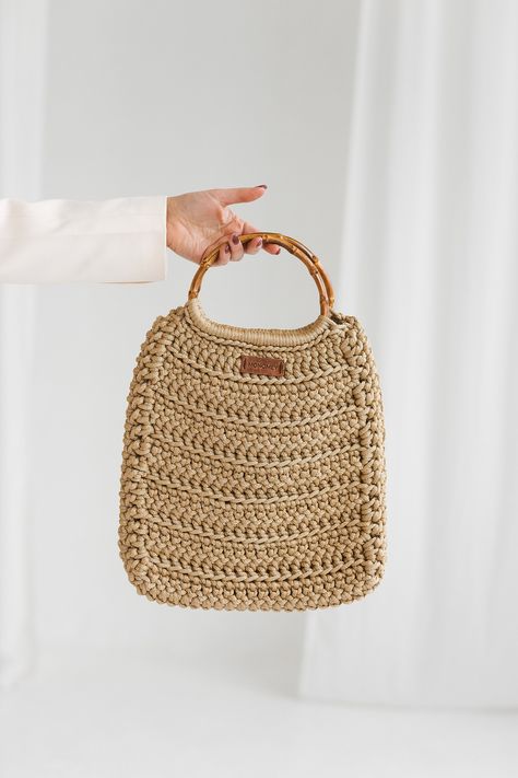 Crochet handbag pattern is created for stylish woman. Color: Golden. MEASUREMENTS: Height: 34 cm (13.4 inches). Height with handles: 45 cm (17.8 inches). Width on the top: 27 cm (10.6 inches). Width on the bottom: 32 cm (12.6 inches). All craft items from MonoMey Studio collection:  www.etsy.com/shop/MonoMeyStudio Made with love! MonoMeyStudio 2023 ©. All rights reserved. Free Crochet Bag, Crochet Handbag, Bamboo Bag, Ready For, Potli Bags, Crochet Handbags Patterns, Handbag Pattern, Handmade Tote, Crochet Tote Bag