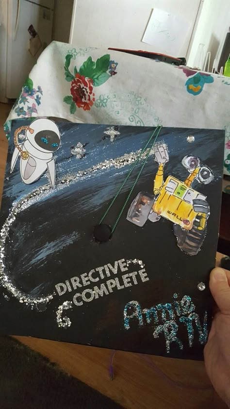 My version of the wall e grad cap. Wall E Nail Art, Wall-e Graduation Cap, Cap Inspiration, Graduate Cap, Creative Graduation Caps, Graduation Hats, College Grad Cap Ideas, Graduation Cap Decoration Diy, Senior Szn