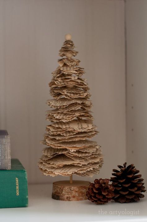 I made this little Christmas tree last year out of old book pages, and it's still one of my favourite decorations this year! It was so easy to make too. #diy #upcycled #christmascraft #christmasdecor #bookpages #oldbooks Old Book Page Crafts Diy Projects, Old Book Diy Decor, Storybook Christmas Decorations, Christmas Tree From Book Pages, Diy Little Christmas Trees, Diy Old Books Crafts, Christmas Book Page Crafts, Book Paper Christmas Trees, Book Paper Christmas Decorations