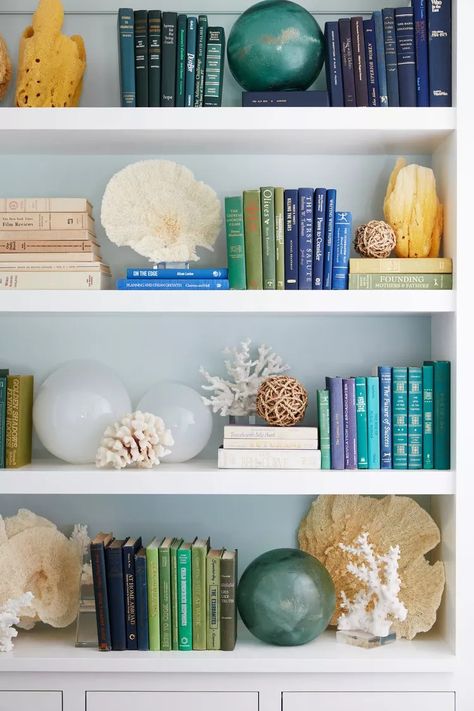 A Home Library Is the Perfect Place for Curling Up with a Book Bookcase Styling Living Room, Coastal Library, In Home Library, Small Home Library, Cozy Library, Home Office Library, Small Ottoman, Bookcase Styling, Library Shelves