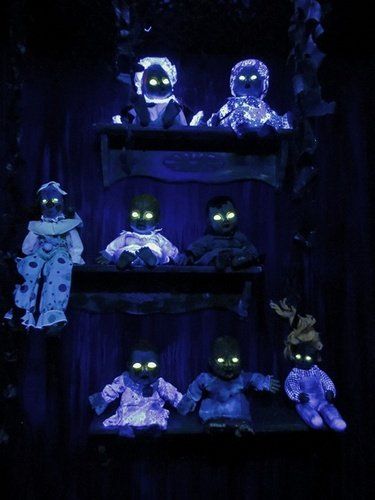 Haunted doll room.  I used Dayglo UV yellow paint for the eyes.  It almost looked like there was a light bulb inside each of them! Haunted Hallway, Porche Halloween, Haunted Carnival, Haunted Trail, Halloween Maze, Halloween Haunted House Decorations, Strašidelný Halloween, Halloween Circus, Halloween Forum