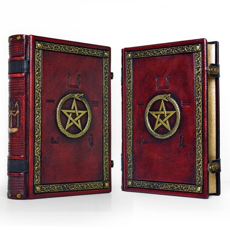 Reddish leather journal with hand carved Ouroboros ~ 10" x 13" large ~ 600 pages ~ near 8 lbs weight ~ etc.  #ouroboros #ankh #pentagram #pentacle #treeoflife #red #bloody #gold #leathercraft #leatherbook #medieval #style #artisan #etsy #alexlibris #bookart Red Grimoire, Magic Artifacts, Fairytale Quotes, Dark Times, Medieval Style, Vintage Book Covers, Cool Books, Black Books, Leather Books