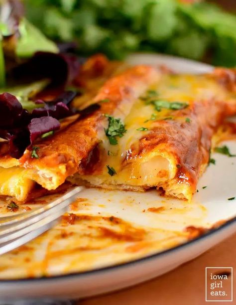 Cheese Enchiladas with Red Sauce is a simple yet outstanding dinner recipe! You'll flip over my easy, homemade red enchilada sauce too. iowagirleats.com keywords: gluten free dinner recipes, vegetarian dinner recipes, gluten free recipes, easy mexican food, cheese enchilada recipe, dinner recipes, dinner ideas, gluten free dinner ideas, gluten free dinners easy Red Chile Enchilada Sauce, Easy Cheese Enchiladas With Red Sauce, Easy Cheese Enchiladas Simple, Cheese Enchiladas With Red Sauce, Cheese Enchilada Recipe, Enchiladas Cheese, Enchiladas With Red Sauce, Easy Cheese Enchiladas, Homemade Red Enchilada Sauce