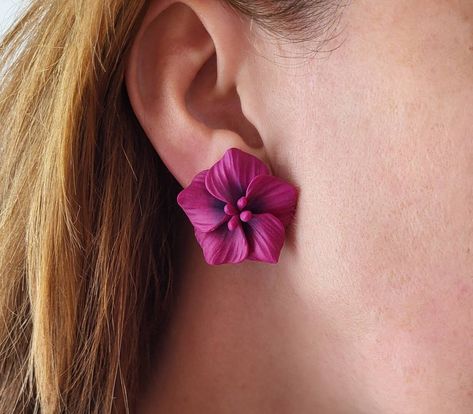 Purple flower stud earrings or clip on earrings Material of flowers - polymer clay  32 mm / 1.25 in Backs- stainless steel in gold toned Polymer clay isn't afraid of water, strong and flexible.. Treat these earrings gently just as you would any other piece of jewellery! Store in a clean, dry place. ALL STUD EARRINGS -https://www.etsy.com/shop/BuduartJewelry?ref=seller-platform-mcnav§ion_id=23177663 ♥All my jewelry come in boxes or bags . If you are purchasing a gift I am happy to include persona Handmade Jewelry Tutorials Step By Step Polymer Clay, Polymer Clay Flower Stud Earrings, Purple Clay Earrings, Polymer Clay Flower Earrings, Flower Clay Earrings, Clay Flower Earrings, Polymer Clay Embroidery, Polymer Flowers, Big Floral