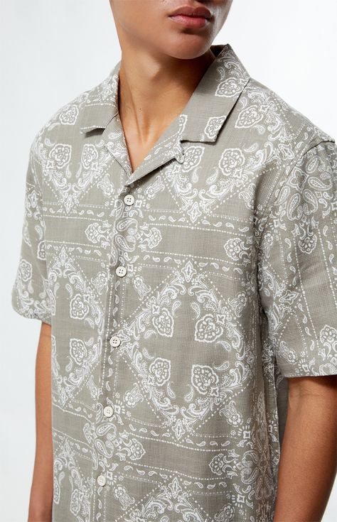 Add a touch of retro flair to your wardrobe with the PacSun Paisley Camp Shirt. This shirt features a classic camp collar, short sleeves, and a relaxed fit for effortless style. With a vibrant paisley print, it's perfect for creating a laid-back yet statement-making look. Whether you're heading to a beach party or a casual outing with friends, this shirt is sure to turn heads.   	Collared neckline 	Short sleeves 	Regular fit 	Button closures 	Paisley print 	100% Cotton 	Machine washable 	Model is wearing size medium 	Model Measurements: 6'0” Height, 36L Suit, 30” Waist, 32” Inseam Neo Classic, Camp Shirt, Social Club, Camping Shirt, Beach Party, Shirt Price, Paisley Print, Pacsun, Model Measurements