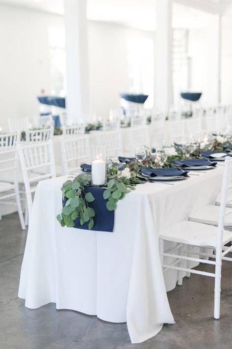 Navy Blue And Greenery Wedding Theme, Steel Blue Wedding Reception, Navy And White Tablescape, White And Navy Centerpieces, Blue Themed Wedding Centerpieces, Navy And White Wedding Table Decor, Navy Wedding Accents, Navy And White Wedding Decorations, Simple Navy Wedding