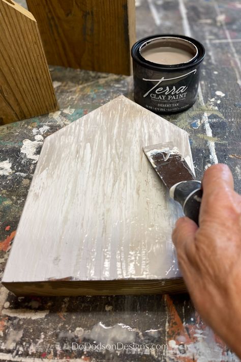 I used a paint scrapping tool to drag paint across my scrap wood block houses to create an amazing textured finish. Diy Primitive Christmas Decor, Scrap Wood Projects Diy Easy, Wood Block Houses, Scrap Wood Christmas, Wood Blocks Christmas, Diy Scrap Wood, Estilo Farmhouse, Primitive Houses, Wood Block Art