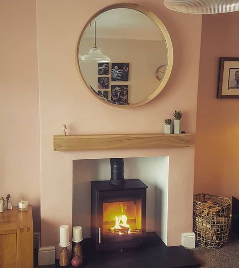 Round Mirror Living Room, Grey Fireplace, Woodburning Stove, Oak Mantel, Wooden Mantle, Room Focal Point, Slate Hearth, Cozy Living Room Design, Grey Slate