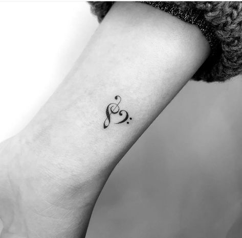 Piano Keys Tattoo Design, Tattoo Ideas Female Music Notes, Music Note Wrist Tattoo, Semi Colon Music Note Tattoo, Small Musical Tattoos, Love For Music Tattoo, Music Note Heart Tattoo, Heart Music Tattoo, Classical Music Tattoo