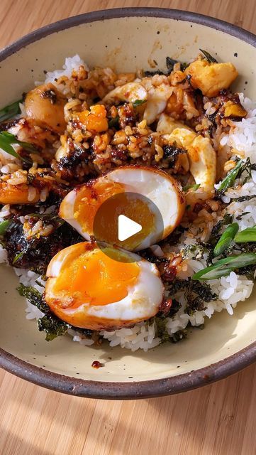 The Kitchn on Instagram: "@jamesyworld is always looking for another delicious egg recipe, and these savory, spicy eggs have quickly become his new favorite.⁣ ⁣ What makes these soft-boiled eggs so amazing is its sweet-and-spicy sauce! Glaze your jammy eggs with the sauce, serve them over a bed of white rice, and you got yourself cozy, hearty meal in 20 minutes.⁣ ⁣ RECIPE🍳⁣ ⁣ 6 eggs⁣ 3 tablespoons butter⁣ 4 minced garlic cloves⁣ 2 tablespoons gochujang⁣ 1 tablespoon chili crisp ⁣ 3 tablespoons maple syrup⁣ 1 teaspoon soy sauce⁣ 1 teaspoon sesame oil⁣ 1/2 teaspoon rice vinegar⁣ Rice for serving⁣ Toasted seaweed (optional)⁣ ⁣ 1. Make soft-boiled eggs by cooking eggs in the boiling water for 6 minutes and 30 seconds. Transfer them to an ice bath to cool down. Peel the eggs and set them aside Asian Egg Recipe, Jammy Eggs, Egg Recipes For Dinner, Cooking Eggs, Spicy Eggs, Sweet And Spicy Sauce, Meat Free Recipes, Egg Recipe, Hearty Meal