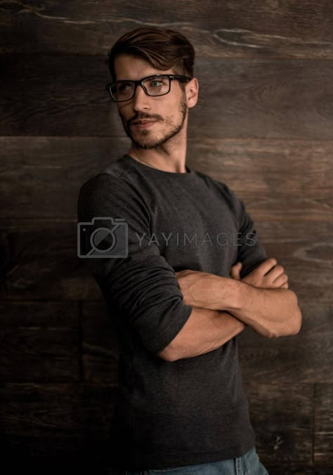 hipster guy wearing glasses with his arms crossed on a dark back #Ad , #glasses, #arms, #crossed, #dark Guy Arms Crossed Reference, Person With Arms Crossed Reference, Crossed Arms Drawing Reference Male, Crossed Arms Reference Male, Grabbing Glasses Reference, Guy Hands In Pocket Pose, Man Arms Crossed Reference, Arms Crossed Male Pose, Guy Crossing Arms