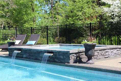 Hot Tub Infinity Edge, Fiberglass Pool With Spa, Infinity Edge Hot Tub, Freeform Pool With Spa And Tanning Ledge, Above Ground Fiberglass Pools, Fiberglass Pool With Hot Tub, Spillover Spa, Pool With Hot Tub, Fiberglass Pool With Hot Tub And Tanning Ledge