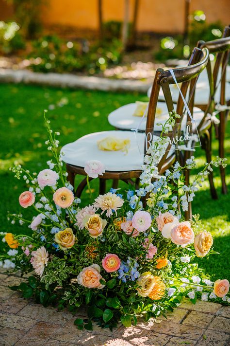 Peach Blue Yellow Bouquet, Spring Wedding Linens, Ground Aisle Arrangements, Colorful Wedding Aisle Flowers, Pink Orange Yellow Blue Wedding, Flower Letters Wedding, Pink Orange Blue Wedding Flowers, Pastel Flower Wedding Cake, Delphinium Wedding Flowers