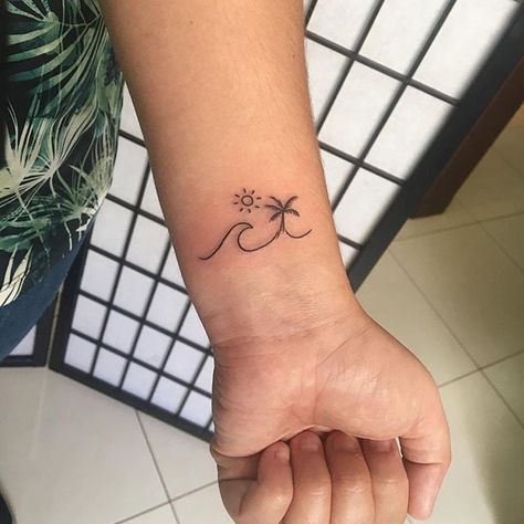 Tiny Summer Tattoos | POPSUGAR Beauty Summer Beach Tattoo, Wrist Beach Tattoos For Women, Small Tattoo Ideas Beach, Tiny Beach Tattoos For Women, Beach Tatoos Woman, Small Tropical Tattoos For Women, Couples Beach Tattoos, Small Beach Inspired Tattoo, Summer Tattoos For Women