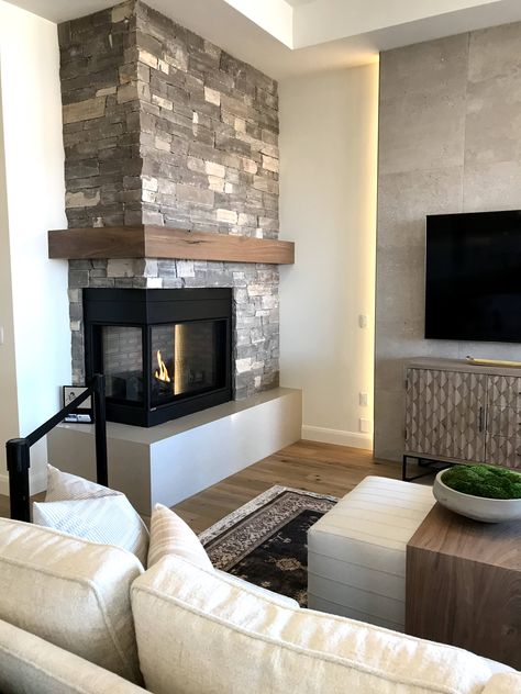 Corner Glass Fireplace Ideas, Open Corner Fireplace, Square Corner Fireplace, Corner Gas Fireplace Ideas With Tv Above, High Fireplace Wall, Corner Fireplace With Shelves, Fireplace Corner Living Room, Corner Chimney Living Room, Corner Fireplace With Built Ins