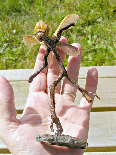 A garden fairy made of, sticks, a rock, wire and resin. I love the creativity. From Craftster blog site. Stick Fairy, Wire And Resin, Wire Ideas, Fairy Garden Furniture, Fairy Stuff, Garden Bugs, Grandparenting, The Enchanted Forest, Fairy Tree