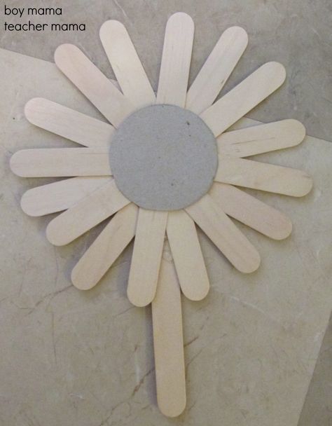 Popsicle Stick Sunflowers  need: cardboard, popsicle sticks halved, 1 whole popsicle stick, paint. Lolly Stick Craft, Popsicle Stick Art, Popsicle Art, Diy Popsicle Stick Crafts, Wooden Craft Sticks, Intelligence Service, Popsicle Crafts, Boy Mama, Stick Art