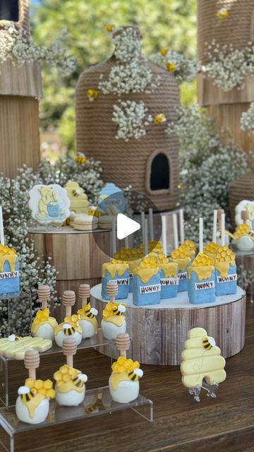 The Blue & White Cottage Co. on Instagram: "Step into  Mike’s Hundred Acre Wood with this enchanting Winnie the Pooh celebration we created last weekend! 🐝✨ From custom place settings to handcrafted beehives nestled in clouds of Baby’s Breath, felt bees fluttering around the dessert table, and a special visit from Pooh Bear himself—every detail was pure magic! 🍯 Add tractor train rides and adorable farm animals, and you have the perfect whimsical adventure. Follow for more luxury event inspiration and unforgettable experiences! 🎉💫 #LuxuryEventPlanner #WinnieThePoohParty #EventPerfection" Vintage Winnie The Pooh Dessert Table, Diy Hunny Pot Winnie The Pooh, Winnie The Pooh Baby Shower Desserts, Winnie The Pooh Dessert Table, Winnie The Pooh Centerpiece Ideas, Felt Bees, Brit Milah, Baby S Breath, Vintage Winnie The Pooh