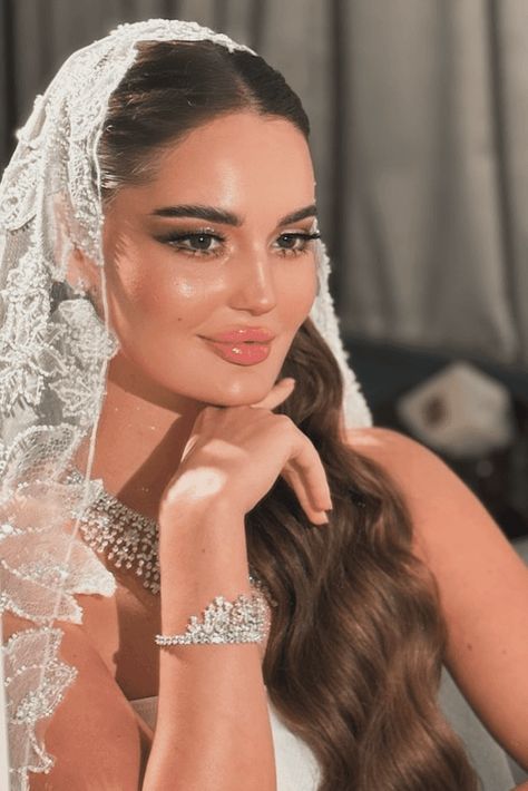 sophisticated hairstyles, enduring hairstyles, occasion hairstyles Middle Eastern Bridal Hair, Wedding Hair Down Middle Part With Veil, Timeless Bridal Hair With Veil, Flower In Hair Bride, Ethereal Wedding Hairstyles, Bride Hair Down Middle Part, Bridal Hair With Long Veil, Timeless Bridal Hair, Bride Hairstyles With Veil