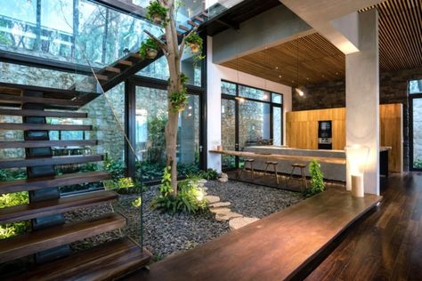 Nature-inspired Teak House welcomes Vietnam’s forests indoors | Inhabitat - Green Design, Innovation, Architecture, Green Building Indoor Courtyard, Rustic Outdoor Decor, Industrial Home Design, Courtyard Design, Interior Plants, Earthship, Courtyard House, Interior Garden, Industrial House