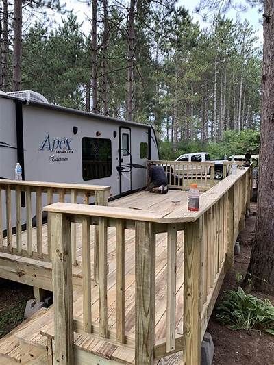 Built a deck at the seasonal site! : RVLiving Camper Decks Ideas Patio, Deck Ideas For Campers, Trailer Deck Ideas, Rv Deck Ideas, Trailer Patio, Porch For Camper, Rv Deck, Trailer Deck, Outdoor Living Deck