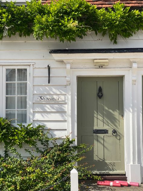 Green Door Cottage, Sage Green Exterior Trim, Sage Green Trim Exterior Houses, White House Sage Green Door, Light Green Shutters White House, Sage Front Door Brick House, White House Sage Green Trim, White House With Sage Trim, Cottage Exteriors Colours