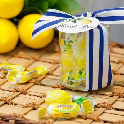 These cute and citrusy lemon-themed party favors are great thank-you gifts for an Italian holiday-inspired wedding, shower, or birthday party. Get details and more inspiration now at fernandmaple.com! Amalfi Coast Party Favors, Lemon Shower Favors, Italian Wedding Party Favors, Lemon Themed Favors, Lemon Theme Party Favors, Positano Theme Party Decorations, Summer Party Favors For Adults, Italian Lemon Baby Shower Theme, Italian Party Favors