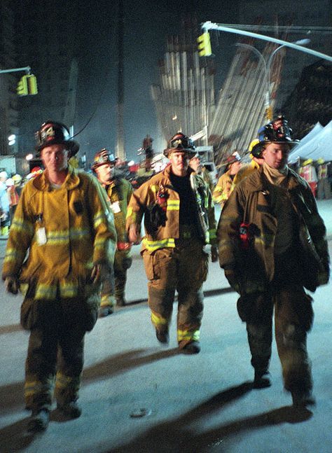 Firefighters and rescue workers worked 24/7 to save lives in lower Manhattan. More than 300 firefighters - in some cases, entire stations - were killed in the collapse of the World Trade Center. Rescue Workers, Volunteer Firefighter, Fire Fighters, We Will Never Forget, Everyday Heroes, Thomas Kinkade, Lest We Forget, Lower Manhattan, Real Hero