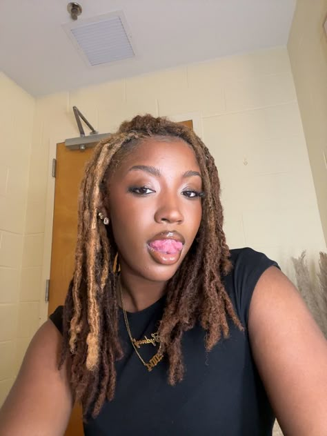 Ash Brown Locs, Honey Locs Black Women, Brown Locs With Blonde Highlights, Honey Blonde And Brown Locs, Honey Blond Locs Black Women, Highlights Locs Black Women, Skunk Stripe Locs Black Women, Blonde Skunk Stripe Locs, Two Tone Locs Black Women