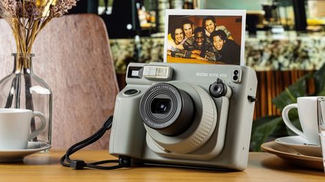 What is it with Instax and releasing seriously ugly cameras lately? Fujifilm Instax Wide, Instax Wide, Tech Magazines, Cameras And Accessories, Photography Camera, Fujifilm Instax, Magazine Design, Large Prints, Cameras