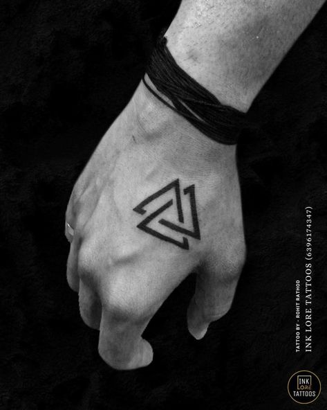 The Valknut: History, Symbolism, and Meaning - Psycho Tats Small Nordic Tattoo Men, Viking Valknut Tattoo, The Fates Tattoos Simple, Valknut Tattoo Meaning, Timeless Tattoo Men, Runes Language, Celtic Symbols Tattoo, Viking Symbols Tattoo, Valknut Tattoo Design