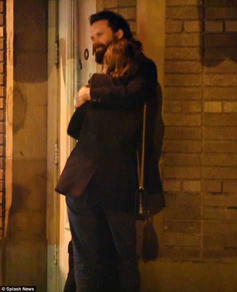 Friendly embrace: Alexa Chung and Joshua Tillman, who goes by Father John Misty, were seen getting close on the streets outside the bar and embracing Father John Misty, Father John, Alexa Chung, Getting Cozy, The Bar, The Streets, Dumb And Dumber, The Outsiders, Angeles