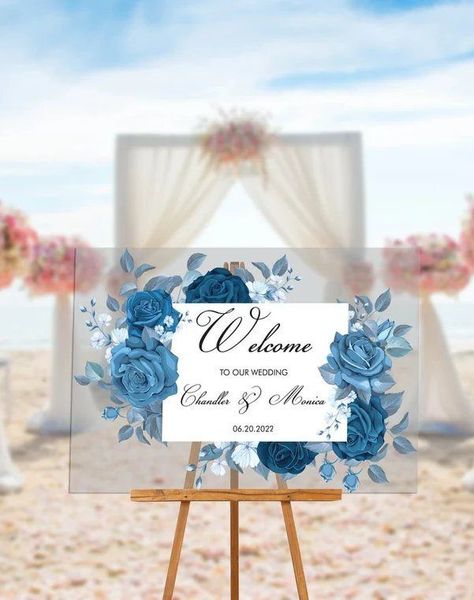 The blue rose design of this gorgeous wedding welcome sign makes for a greeting that will greatly impress your guests. The sign is made of high-quality clear acrylic and comes in an array of sizes to perfectly fit into your decor. Blue Reception Decorations, Sky Blue Decorations Wedding, Dusty Blue Wedding Reception Decor, Twilight Blue Wedding Decor, Blue Reception, Wedding Decorations Blue, Blue Wedding Sign, Blue Wedding Decor, Dusty Blue Wedding Signage