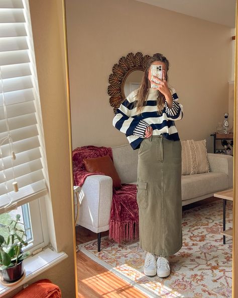 Falling for this cargo skirt 🤗🍂 because who doesn’t love a skirt with pockets this big?! #CargoCrush #FallFits #fallfashion #cargoskirt #stripesweater #converse #LavenderHoney #apparel #boutique #clothing #smallbusiness Maxi Cargo Skirt Outfit, Long Cargo Skirt Outfit, Long Cargo Skirt, Cargo Skirt Outfit, Apparel Boutique, T Love, Fall Fits, Skirt With Pockets, Cargo Skirt