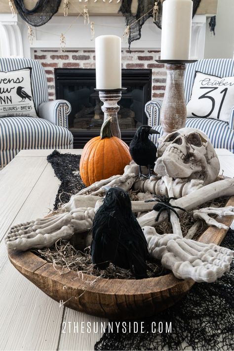 How to decorate for Halloween inside without being too cute or too scary! Find the perfect balance to decorating your home for Halloween this year! #decoratinghalloweenindoor #livingroomhalloweendecorideas #livingroomhalloweendecor Halloween Bread Bowl Decor, Halloween Dough Bowl Decor, Island Halloween Decor, Kitchen Island Halloween Decor, Halloween Island Decor, Halloween Kitchen Island Decor, Halloween Chandelier Decor, Halloween Entry Table Decor, Halloween Entryway Decor