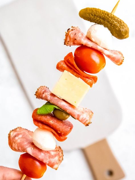 Take your meat and cheese to go with these quick and easy Charcuterie Skewers. Perfect for beach trips, cookouts, or anytime you need a protein-packed snack that’s easy to toss in your cooler, these deliciously customizable charcuterie kabobs are the meat appetizer you’ve been missing! Meat And Cheese Skewers, Charcuterie Kabobs, Charcuterie Skewers, Cheese Skewers, Turkey Blt, Easy Charcuterie, Antipasto Skewers, Skewer Appetizers, Protein Packed Snacks