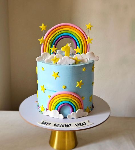 A sky full of rainbows !!! 🌈🌈🌈 A whipped cream cake with fondant accents for first birthday..🎂🎉 #rainbowcake #rainbowcakes #firstbirthdaycake #cakeforboy #kidscake #cakeforkids #Noida #noidahomebaker #noidabaker #noidabakery #tallcake Sky Birthday Cake, Rainbow Fondant Cake, Rain Cake, Clouds Cake, Sky Cake, Whipped Cream Cake, Cake With Fondant, Cake Artist, Rainbow Clouds