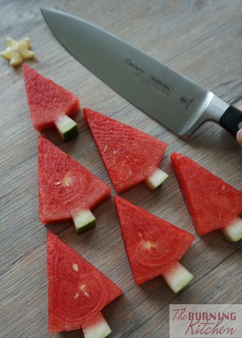 How to Cut Watermelon Christmas Trees | The Burning Kitchen Christmas North Pole Breakfast, Watermelon Tree, Christmas Starters, North Pole Breakfast, Christmas Buffet, Watermelon Carving, Cut Watermelon, Christmas Fruit, Pre Lit Christmas Tree