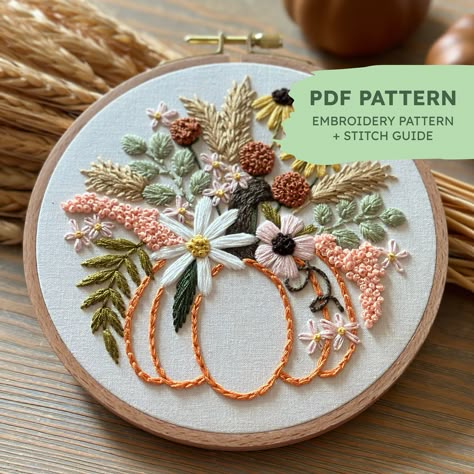 This listing is for an instant digital download PDF embroidery pattern. You will not receive a physical item.  This Autumn Harvest modern hand embroidery pattern features a plump pumpkin surrounded by a sunny palette of fall flowers, eucalyptus and wheat. Its the perfect stitchy project for harvest season! This pattern is perfect for someone comfortable with favorite intermediate stitches and some layering, although anyone is welcome to give it a go. The pattern is designed for a 6 inch circular Fall Hand Embroidery, Modern Hand Embroidery Patterns, Pdf Embroidery Pattern, Diy Embroidery Kit, Stitch Guide, Hand Embroidery Kit, Halloween Embroidery, Hand Embroidery Flowers, Learn Embroidery