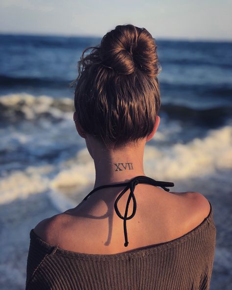 Roman Numeral 17 Tattoo, Back Roman Numeral Tattoo, Roman Numeral Tattoo Back Of Neck, Neck Tattoo Roman Numerals, Roman Numeral Tattoo On Neck, Back Of Neck Roman Numeral Tattoo, Elegant Roman Numeral Tattoo, Roman Numeral Wrist Tattoo, 17 Tattoo