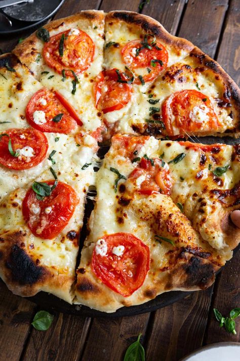 This Four Cheese Margherita Pizza is so easy and so delicious! Actually, this is our favorite. We pretty much only eat margarita lately and while we love a classic margherita, this one is packed with so much flavor it's hard to not make it. #margheritapizza #pizzarecipe #homemadepizza #CheesyPizzaMelts Four Cheese Pizza, Margherita Pizza Recipe, Terrine Recipe, Family Pizza Night, Recipe Inspirations, Cheese Twists, Perfect Pizza Dough, Creamy Pasta Dishes, Pizza Margherita