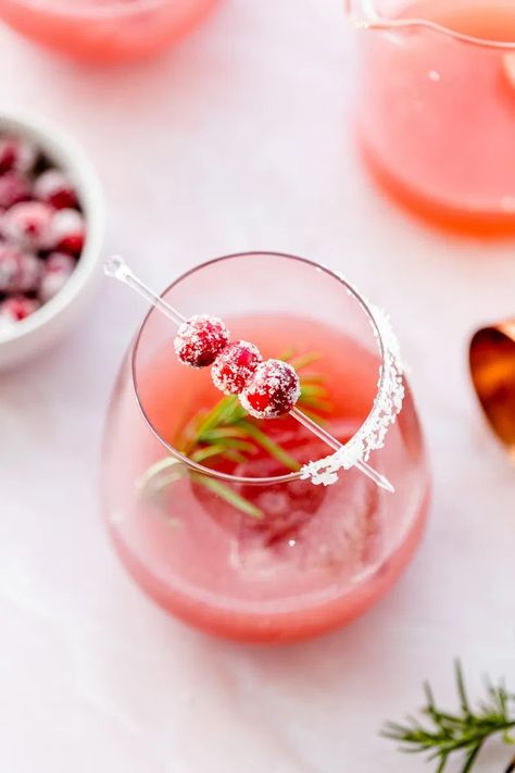 A simple and refreshing cranberry paloma cocktail for the holidays, with a sugared cranberry and rosemary garnish. Holiday Paloma Cocktail, Christmas Paloma Cocktail, Winter Paloma Cocktail, Cranberry Paloma Cocktail, Pomegranate Cranberry Cocktail, Cranberry Paloma Cocktail Tequila, Drink Competition, Cranberry Paloma, Fm Christmas