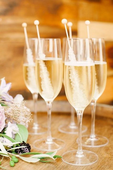 Champagne and rock candy toasting flutes | 21 Glitzy Gold Wedding Ideas via @perfectpalette Rock Candy Sticks, Gold Drinks, Signature Cocktails Wedding, Cocktail Hour Wedding, Drink Bar, Bachelorette Party Beach, Champagne Cocktail, Tequila Sunrise, Swizzle Sticks