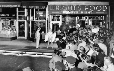 At the publicity stunt in New York, a large crowd of bystanders and press were invited to create hype around the filming. (Photo © Sam Shaw Inc. licensed by <a href="http://www.shawfamilyarchives.com">Shaw Family Archives</a>) 7 Year Itch, The Seven Year Itch, Seven Year Itch, Marilyn Monroe Dress, Lee Strasberg, Bert Stern, Monroe Dress, Lady Godiva, Movie Locations