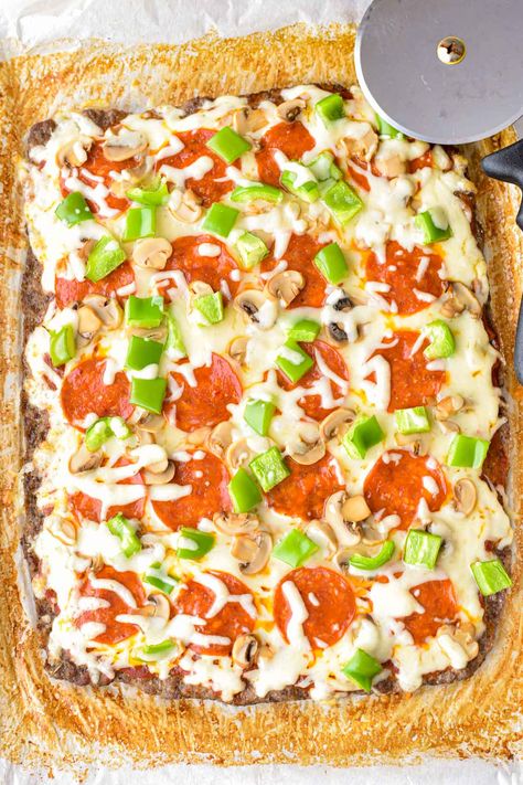 Super delicious and filling, this Low FODMAP Keto Pizza with a Meat Crust, a.k.a. "Meatza," is like eating pizza toppings on a meatball! #LowFODMAP, #Keto, #lowcarb, #grainfree, and #glutenfree. Can be made #lactosefree by using a lactose-free pizza mozzarella. ~ Good Noms, Honey! ~ Low FODMAP Pizza ~ Low FODMAP Meatza ~ Low FODMAP Pizza Crust ~ Low FODMAP Pizza Sauce ~ Low FODMAP Pizza Toppings ~ Low FODMAP Keto Recipes ~ Low FODMAP Low Carb Recipes Low Fodmap Keto, Low Fodmap Pizza, Fodmap Pizza, Meatza Pizza, Meatza Recipe, Recipes Low Fodmap, Fodmap Dinner, Diet Apps, Eating Pizza