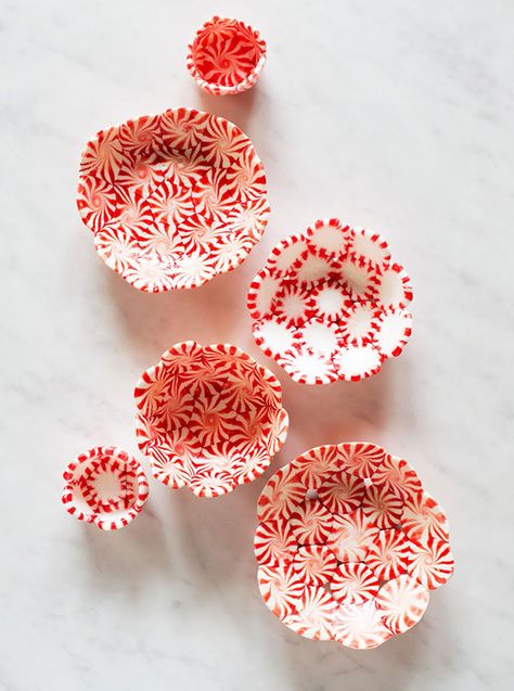 Impress guests with these DIY peppermint bowls, perfect for filling with cookies, dip and more.  Get the instructions at PurlSoho.  - WomansDay.com Peppermint Candy Bowl, Candy Cane Crafts, Candy Crafts, Holiday Crafts For Kids, Navidad Diy, Easy Christmas Crafts, Gorgeous Christmas, Candy Bowl, Peppermint Candy