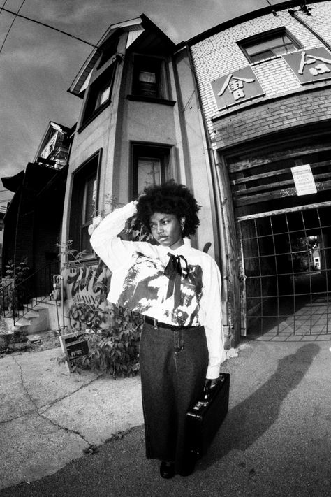 standing in kensington market #fisheye #wideangle #blackandwhite #portraitphotography #photography #businesscore #afro #briefcase Shirt Photoshoot, Fisheye Photography, Kensington Market, Eye Lens, Beware Of Dog, Fish Eye Lens, Fish Eye, Crop Dress, Photoshoot Concept