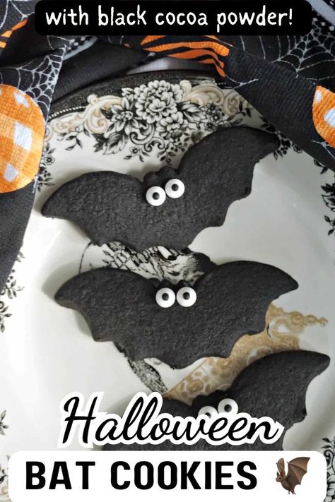 3 bat cookies on a plate. Bat Desserts, Edible Googly Eyes, Halloween Bat Cookies, Bat Cookies, Black Cocoa Powder, Delicious Halloween Treats, Bats Cookies, Cocoa Powder Recipes, Black Cocoa