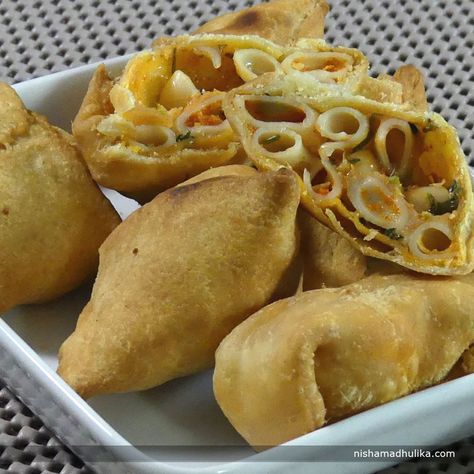 Macaroni cheese samosa is really scrumptious dish and your kids will relish eating them for sure. Recipe in English- http://indiangoodfood.com/615-macaroni-cheese-samosa.html ( copy and paste link into browser) Cheese Samosa, Pasta Cheese, Al Madinah, Samosa Recipe, Chinese Noodles, Cheese Stuffed, Easy Snack Recipes, Macaroni Cheese, English Food